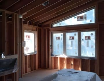 Interior framing prepared for spray foam insulation in Canton, MI.