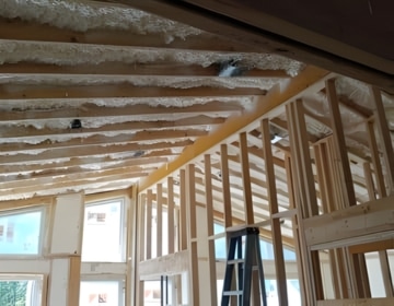 Spray foam insulation applied after energy audit to seal air leaks