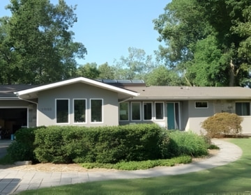 Energy-efficient home upgraded with modern spray foam insulation for improved comfort and lower energy loss